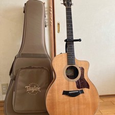 Guitarra electroacústica Taylor 214ce con pastilla guardabarros usada?