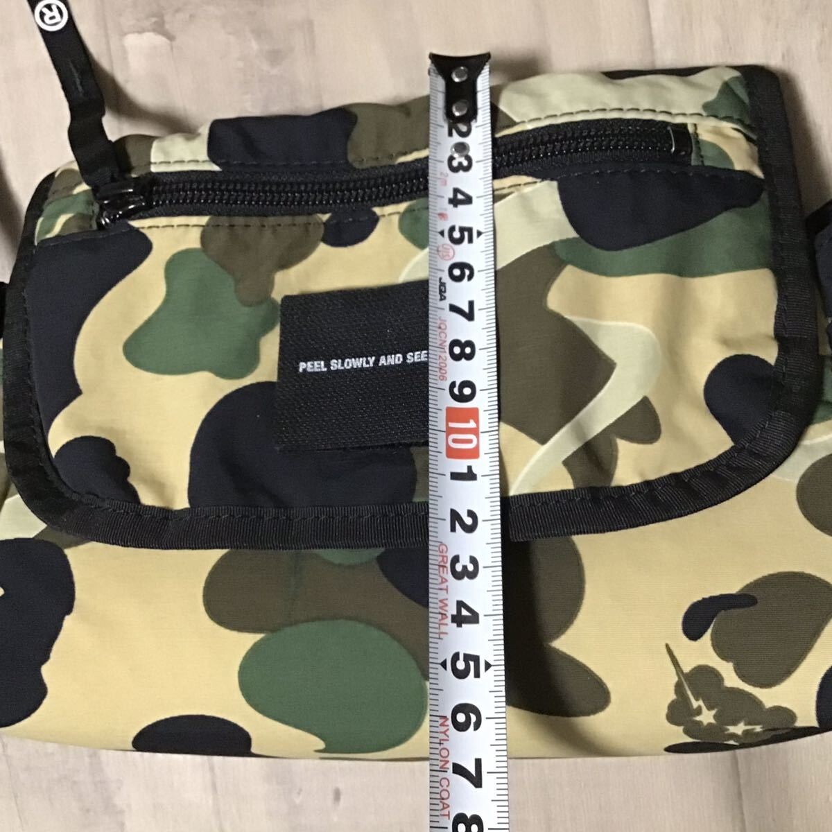 BAPE × KAWS shoulder bag bendy 1st camo yellow NIGO A Bathing Ape
