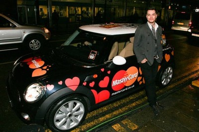 Matt Willis poses in BRITs Mini during The 27th BRIT Awards Launch- Old Photo 2
