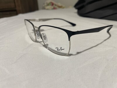 glasses . Brand new . Ray ban . Gray and black. 