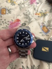 Image of Fossil Men's Silver Stainless Steel Watch With Blue Band
