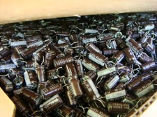 One BOX 6136 pcs Nichicon 82uF / 25V Aluminum Electrolytic Capacitors - Unused