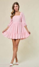 Textured lace mini dress in pink