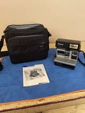 Polaroid Spirit 600 instant camera with Polaroid bag and booklet