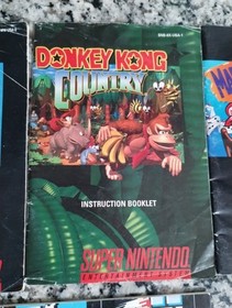 Lot of 4 NES  Nintendo & SNES Super Nintendo Manuals- Donkey Kong Country, Mario