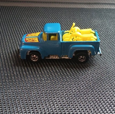 Hot Wheels Hi-Tail Hauler Ford Blue Diecast Pickup Truck with Yellow Motorcycles