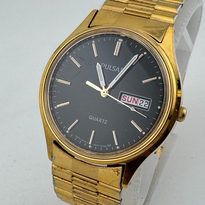 #ad Vintage Pulsar Quartz Watch V533 7A20 Men Gold Tone Black Day Date New Battery $29.74
