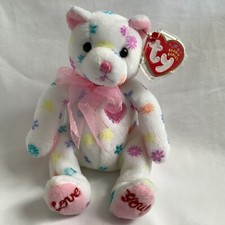 “MOM-e” beanie baby bear by Ty. Tags attached. Never used.
