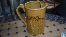 pichet ancien collection Pastis Janot faience brillante jaune foncé