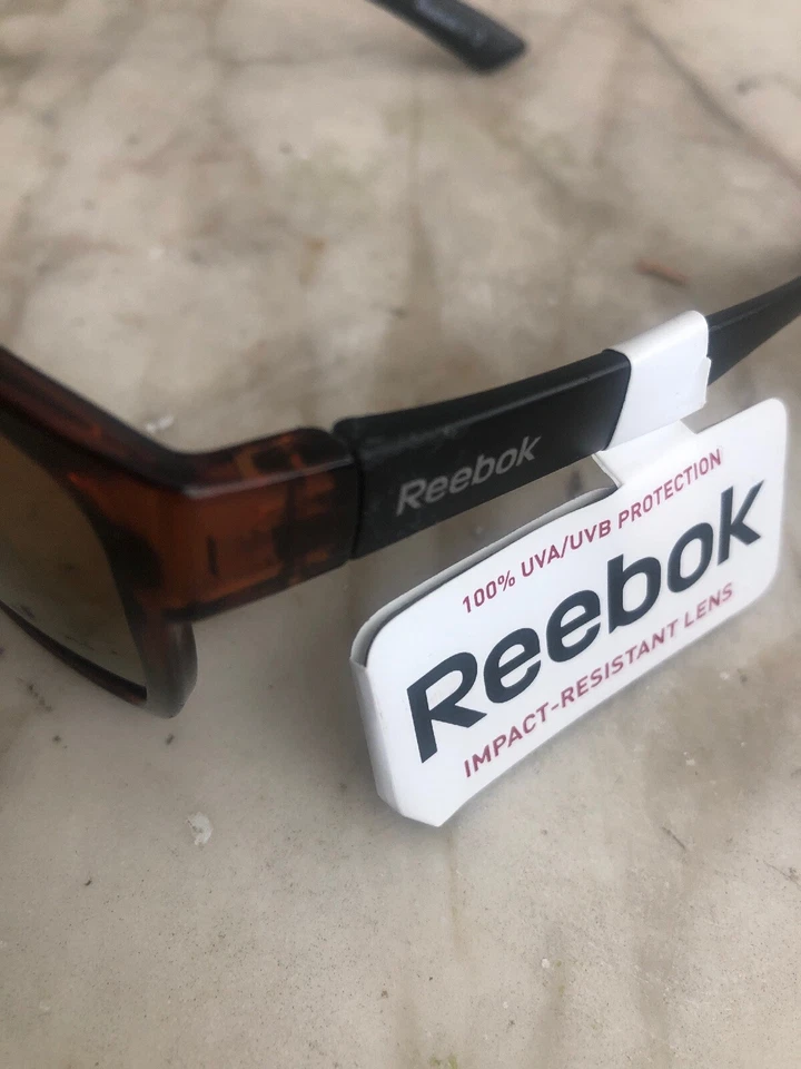 Gafas de sol deportivas cuadradas para ciclismo golf doradas resistentes a impactos Reebok RB24 DEMI  Foto 3 de 4