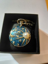 sun and moon with pearl pocket watch