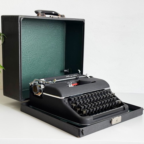 working Olympia SM2, portable vintage typewriter from the 1950S, black