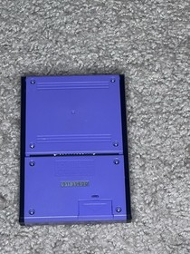 Original Game and Watch Disney Mickey Mouse handheld System.
