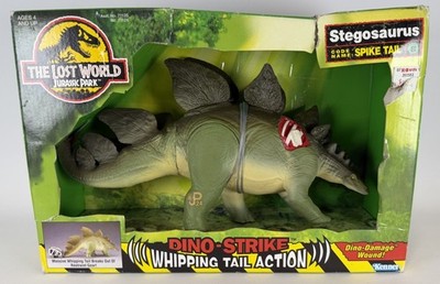 新品タグ付き Spick and Span Oblada DINOSAUR T JURASSIC PARK THE LOST WORLD DINO-STRIKE STEGOSAURUS SPIKE TAIL