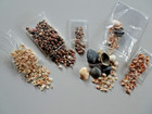 Variety of natural seashells, some already with holes, for crafts, jewelry. — photo 1