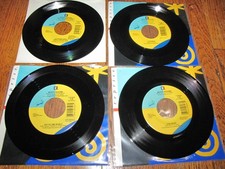 KENNY ROGERS - COLLECTION OF 9 KENNY ROGERS 7" SINGLES IN SLEEVES
