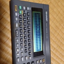 Sharp PC-G801 Pocket Computer Calculating Programming Used