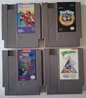 4 game NES lot Mickey Mousecapade, Tiny Toon Adventures, Yo Noid, Bugs Bunny