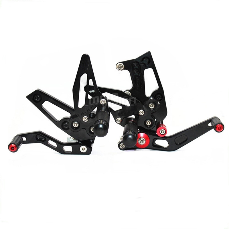 Commandes reculées Kalyosa noires pour Triumph Speed Triple 1050 2005-2010