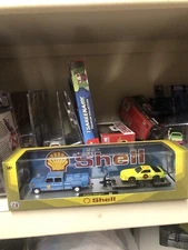 M2 Machines Hauler 2 Pack -1977 Chevy Cheyenne Super 30 & 1985 Camaro IROC-Z R83