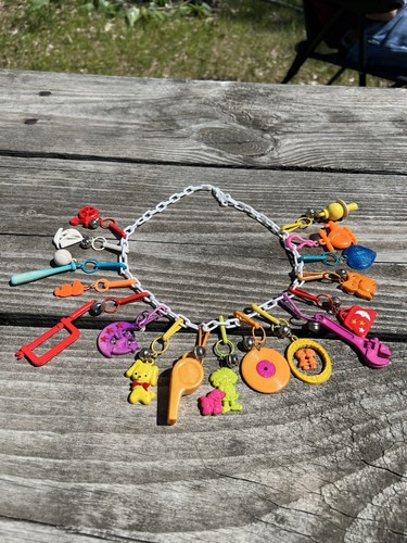 Vintage 1980’s Plastic Charm Necklace W/17 Charms.