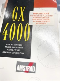Consola Amstrad GX4000 en caja con 32 carro de juegos