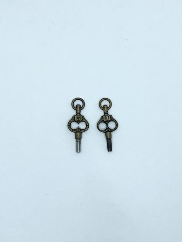 2 x Unusual vintage antique brass pocket watch keys pendants sizes 3 and 7