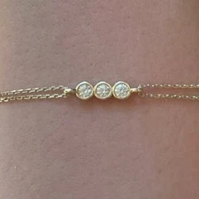 Three Stone 4mm Round 0.75 CTW Moissanite 8 Inch Bracelet 14K Yellow Gold Plated