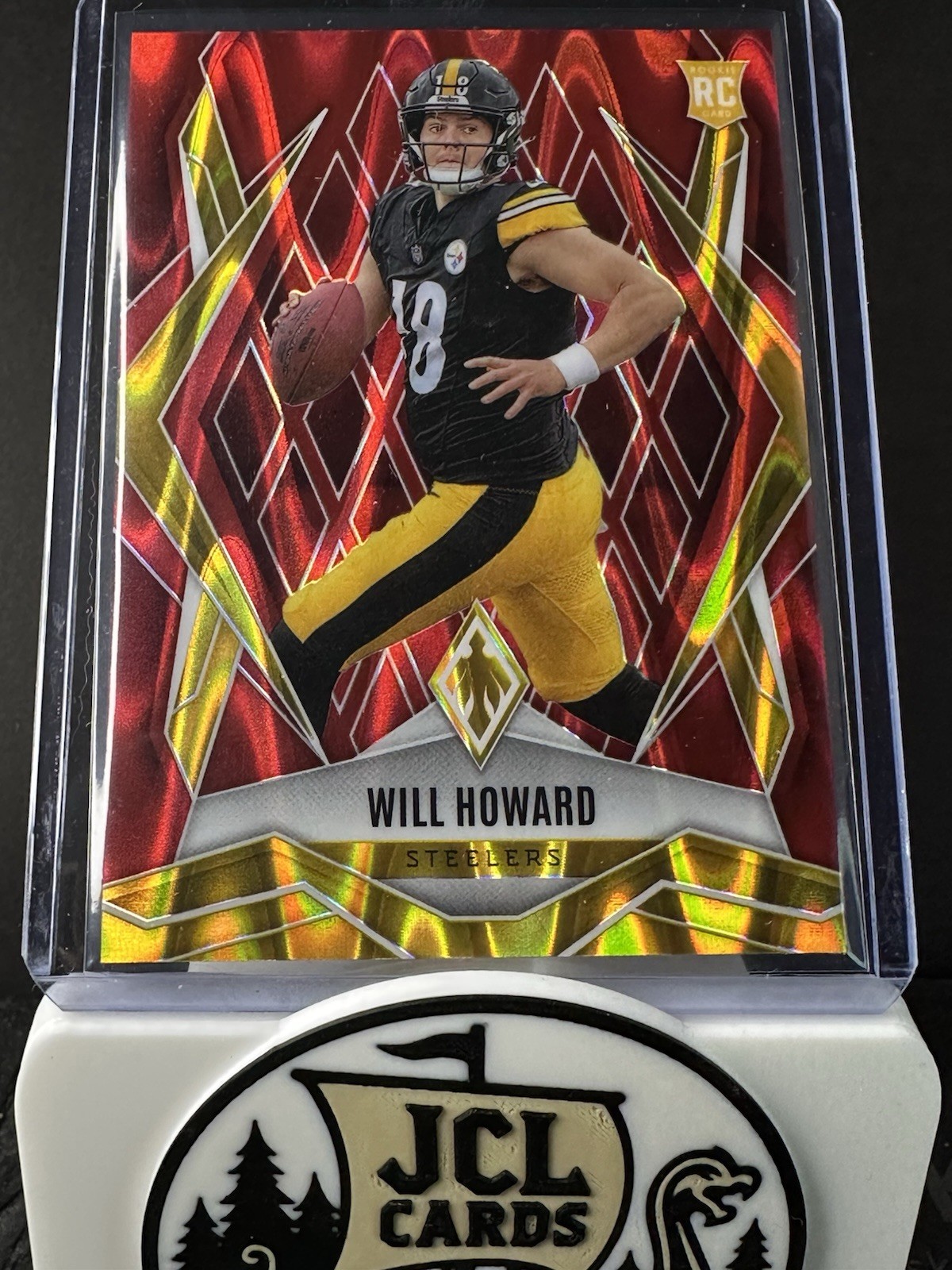 2025 Panini Phoenix - Rookies Will Howard #165 Red Seismic /99 (RC)