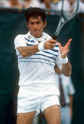 Ken Rosewall of Australia hits a return at a match in the Men's 19- Old Photo 22