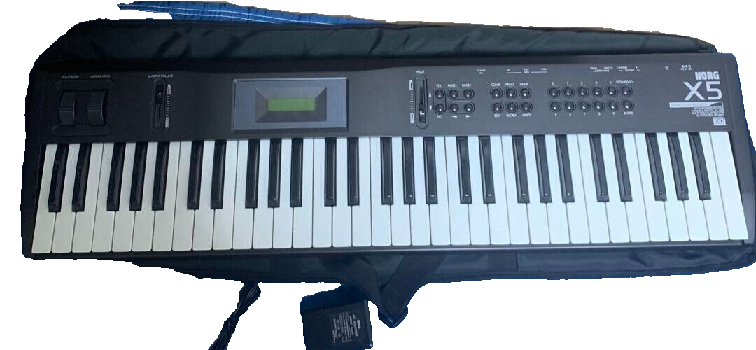 KORG X5 Music Synthesizer 61 Key w /Power supply cord used KORG X5 Music Synthesizer 61 Key w /Power supply cord used