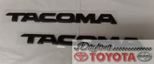 OEM TOYOTA TACOMA MATTE BLACK  DOOR EMBLEMS 2010-2018 75427-04041 SET OF 2