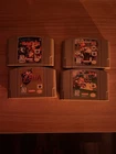 Nintendo 64 Game Lot: OOT, Mario Kart 64, Banjo-Kazooie, Super Mario 64.