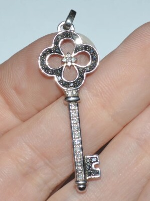 DESIGNER SIGNED STERLING SILVER BLACK AND CLEAR DIAMONDS KEY PENDANT 