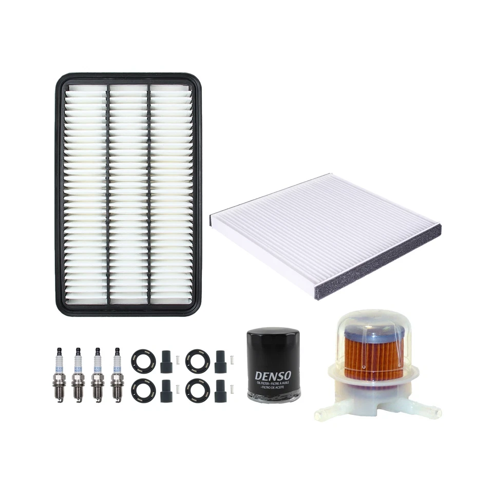 Kit de 4 bujías y botas Denso Tune Up Kit para Toyota Solara SE 2.4 L4 2002-2003 Foto 2 de 2