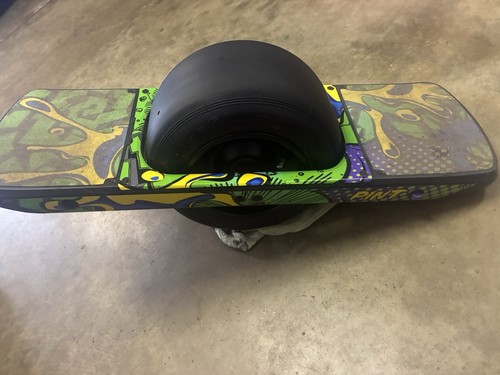Working low mileage Onewheel Pint with custom Green Rails wrap