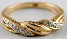 Gold ring 14k. with small stones.