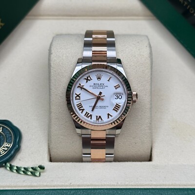 Rolex Datejust 31 NEW 2026 White Roman Dial Two Tone Rose Gold Fluted Oyster