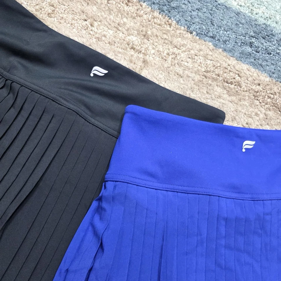 Lote de 2 Skorts Plisados para Mujer Fabletics Medianos Negros y Azules Nuevos con Etiquetas Tenis Golf Foto 2 de 4