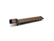 Remolque de plataforma plana con eje de viaje DCP 1:64 *NEGRO* LANDOLL 440 *NUEVO*