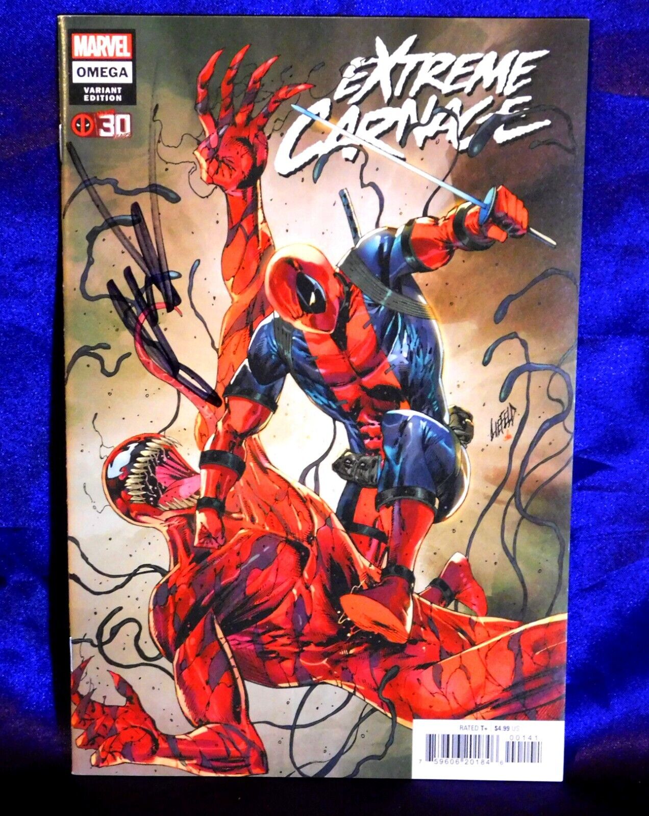 EXTREME CARNAGE OMEGA #1 DEADPOOL VARIANT EDITION SIGNED BY ARTIST ROB LIEFELD