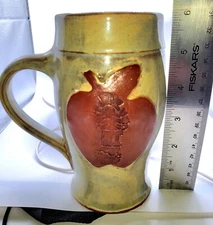 Hand Crafted Mug with apple RCC shoe design 