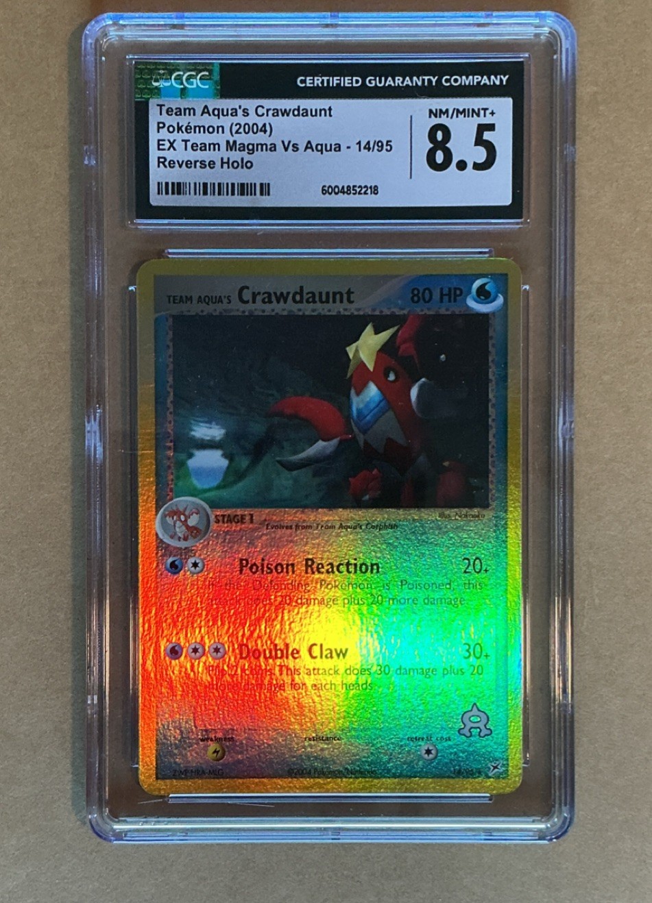 Team Aqua's Crawdaunt CGC 8.5 EX Team Magma vs Aqua 14/95 Reverse Holo