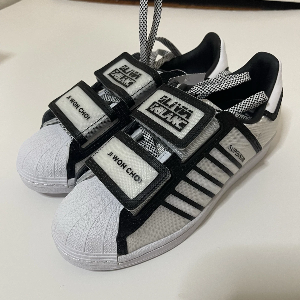 トップス adidas ji won choi olivia oblanc Preços baixos em adidas Olivia Oblanc x Ji Won Choi x Superstar