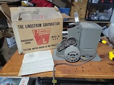 Vintage Lindstrom No. 1015-A 16 mm projector with original box and Instructions