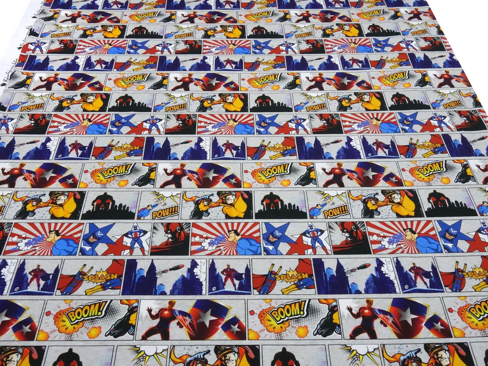 Stoff Baumwolle Jersey Superhelden Comic grau blau rot gelb bunt
