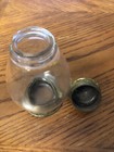 Vintage Clear Glass Imprinted Lettering Pepper Shaker with Brass Bottom and Lid — photo 5