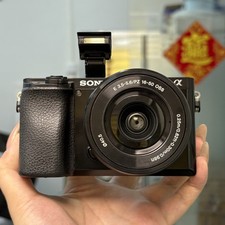 Sony Alpha a6100 24.2MP Mirrorless SLR Digital Camera W/ 16-50mm Lens English
