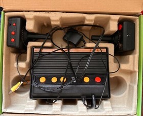 Atari Flashback 7 Classic Game Console - Never Used- Black/Orange