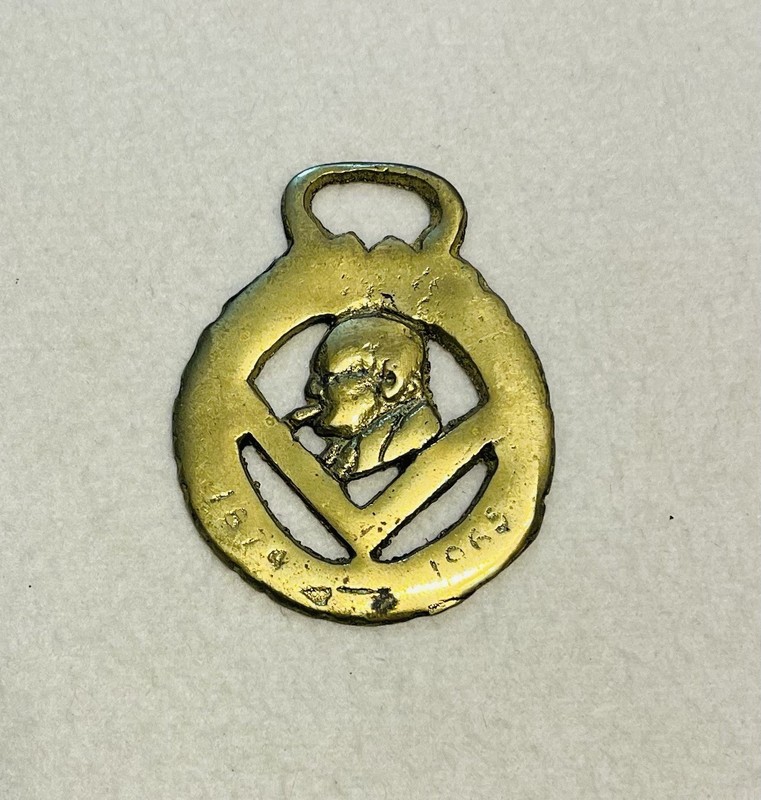 VINTAGE BRASS EQUESTRIAN/HORSE MEDALLION BALD MAN SMOKING A CIGAR 1874-1965